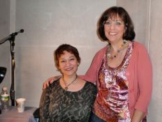 Carol and I inside the sound booth. A mike and a bottle of water is all she needs...